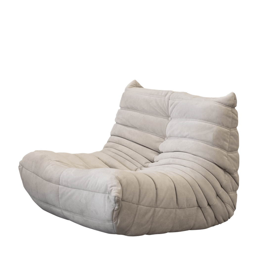 Indulge in luxury with the modern Chillax Lounger Sofa Chair in light grey. Its tufted, crumpled design and low profile make it an ideal addition to any contemporary space.